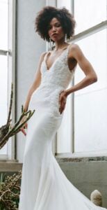wedding dress with v-neck shaped top and solid white bottom